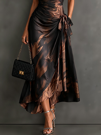 Rosalie | Vestido midi cruzado con estampado abstracto, escote en V, manga corta, cinturón y bajo asimétrico con volante